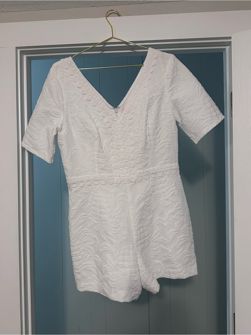 White Textured V-Neck Romper with Crochet Trim